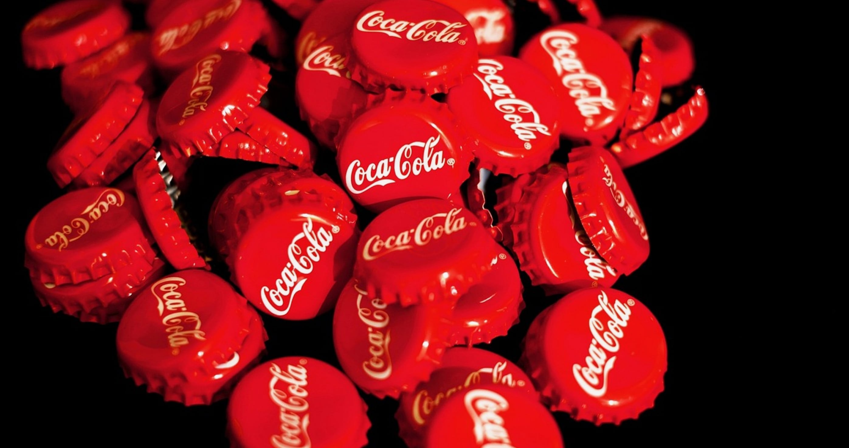 Will Coca-Cola's Share Price Rise After Strong EPS Growth?